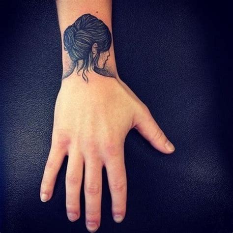 upper wrist tattoo